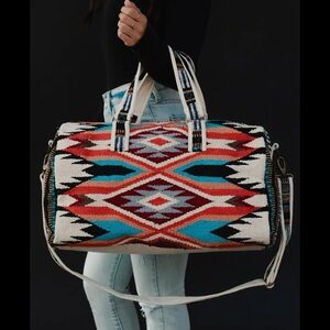 Stunning Duffle Bag
Made in the USA 
Lined